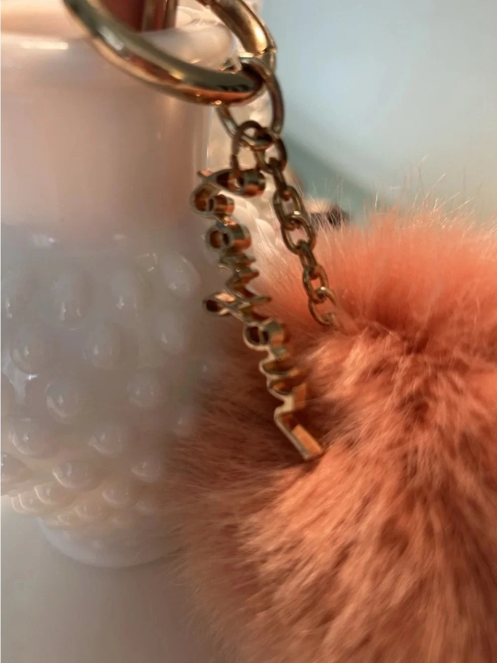 Anthropologie Fluffy Pom Pom Keychain in Blush. Medium. Bonjour Charm Gold Toned
